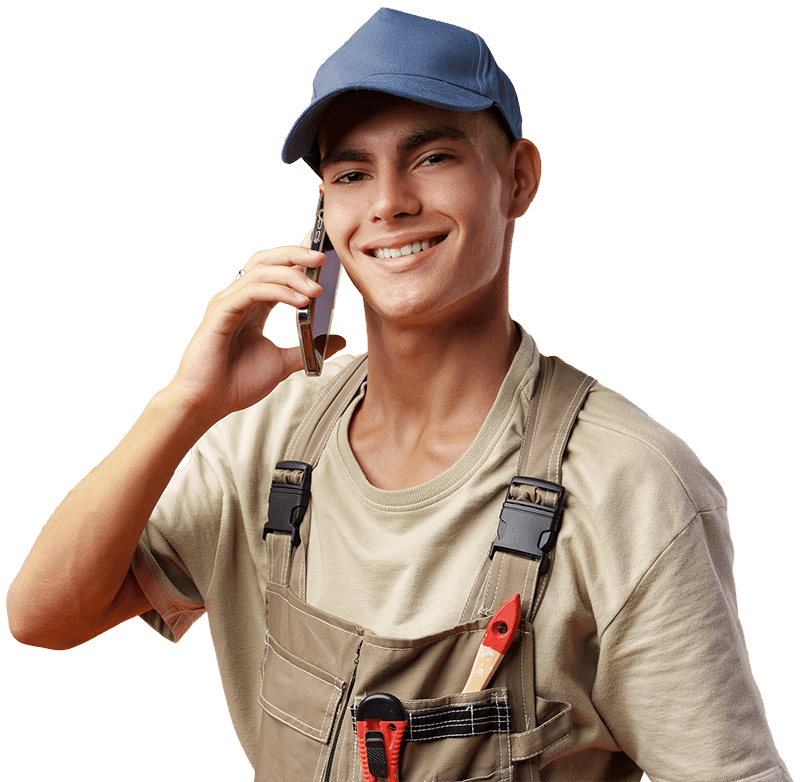 smiling handyman on phone