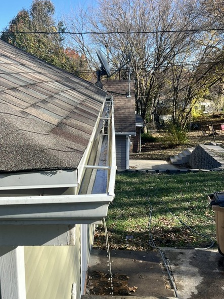 Exterior shot of a newly cleaned gutter